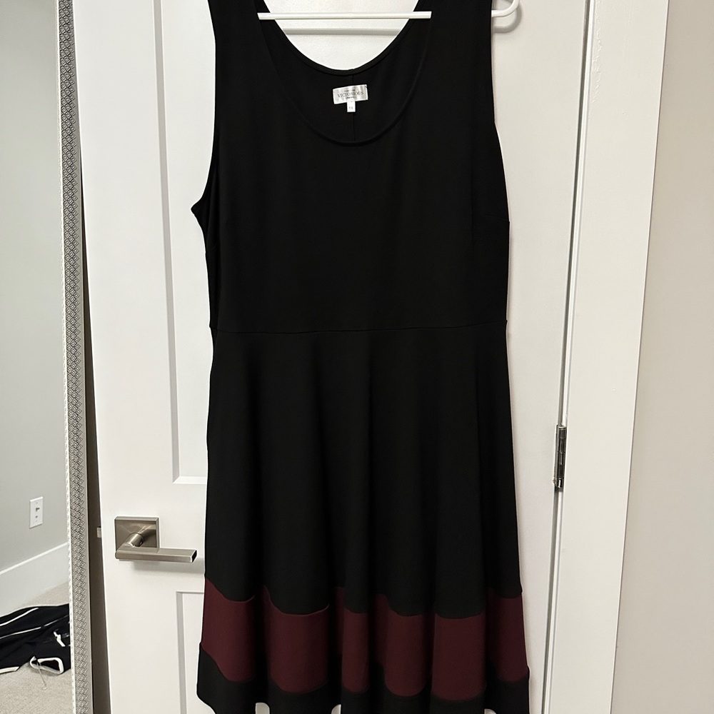 Black Jersey dress with Merlot band and pockets. Never worn. By Society